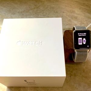 Original Apple Watch, stainless steel 42mm case, silver sport loop band.